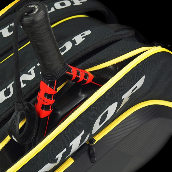 DUNLOP Elite padela soma, melna/dzeltena