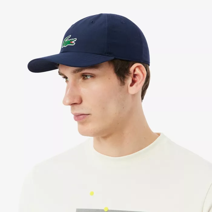 Casquette lascoste on court djokovic