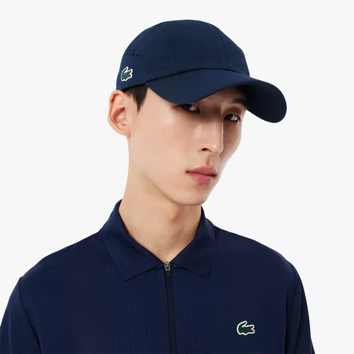 Casquette LACOSTE on court