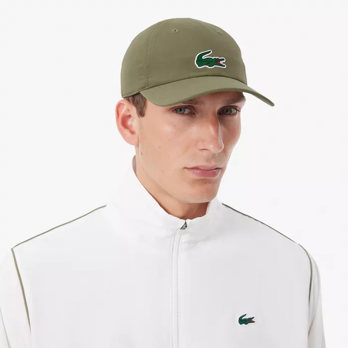 Cap lascoste on court djokovic